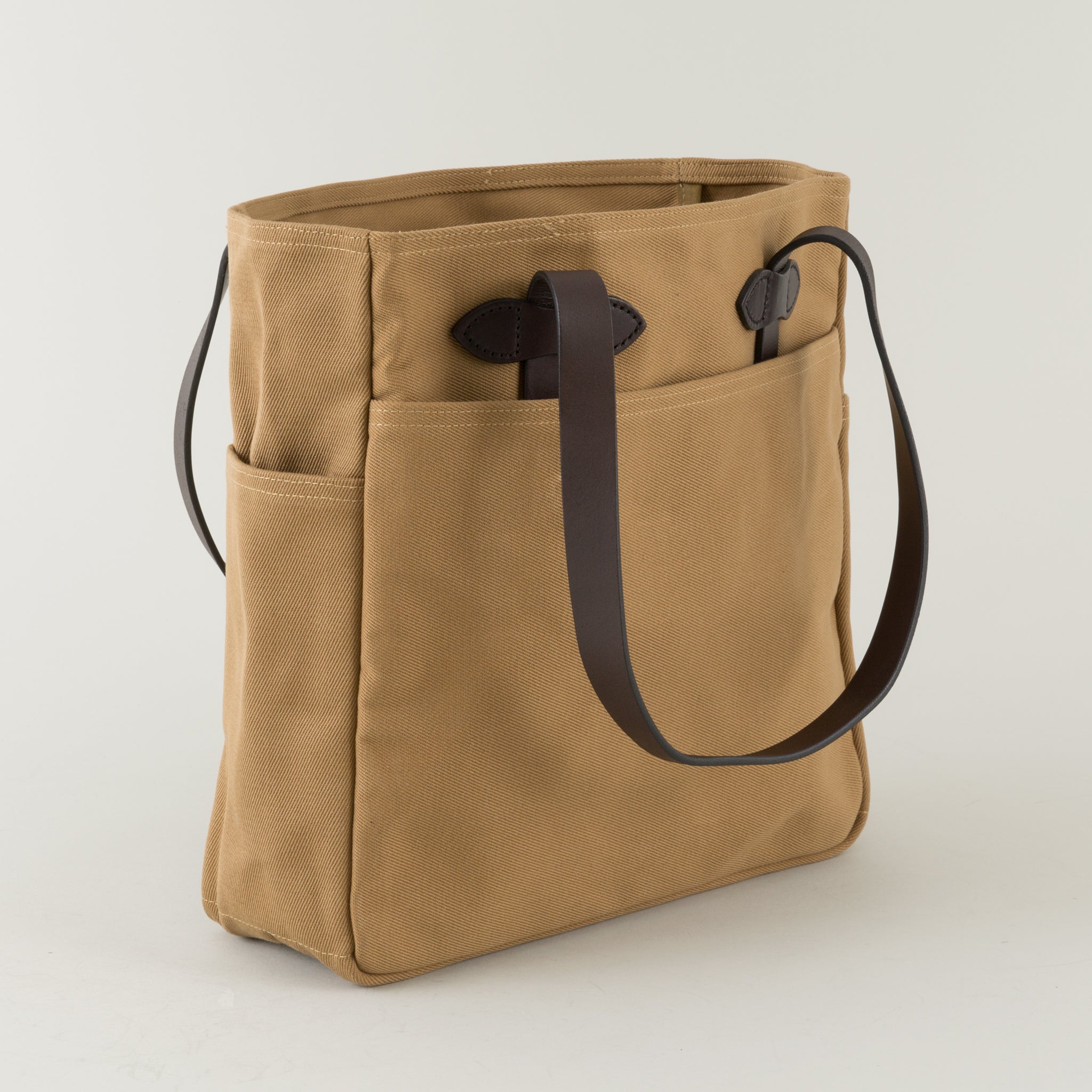 https://thestronghold.com/cdn/shop/products/FILSON-TOTE-BAG-TAN_X2_234e6426-101a-4ef6-81c9-776f9edb4132.jpg?v=1539486470